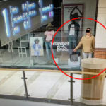 Rapinatore finge di essere manichino ma la polizia non ci casca