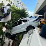 Donna verpasst das Pedal und findet sich gerettet mit dem SUV wieder, der auf dem Parkplatz baumelt