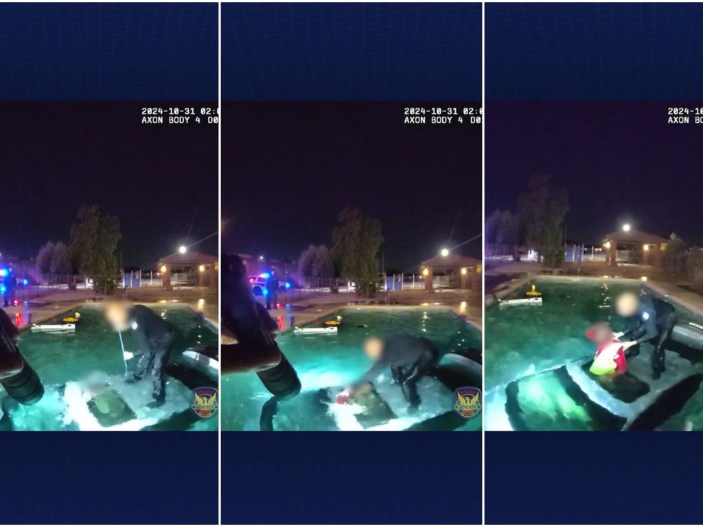 Auto piomba in una piscina, il drammatico salvataggio della polizia: video