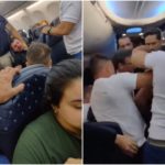 Er versucht, die Nottür des Flugzeugs zu öffnen, Passagiere blockieren ihn gewaltsam